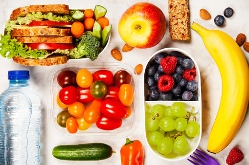 Image of healthy fruit on a plate. Healthy food alternatives to sugar based meals are necessary for proper oral health.